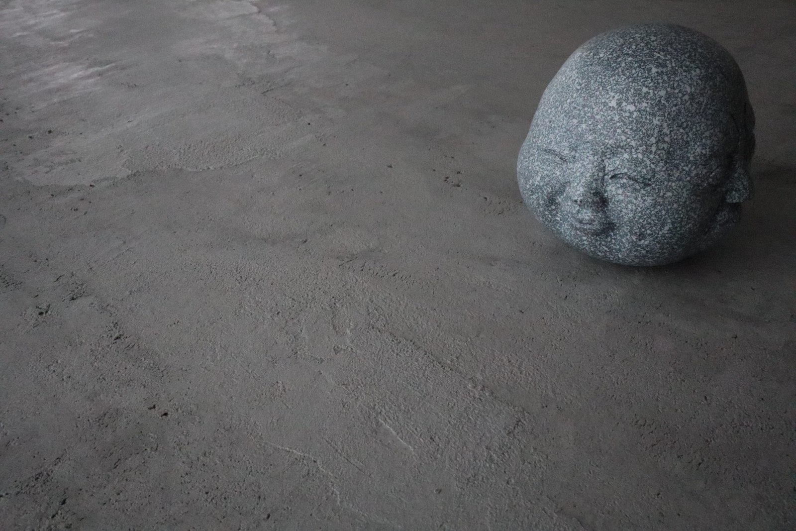 Concrete sculpture on microcement floor