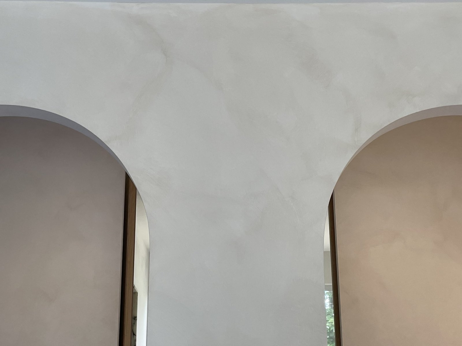 Limewash walls with arched doorways